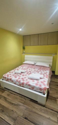 Кровать или кровати в номере Casa vacanze Harmonie