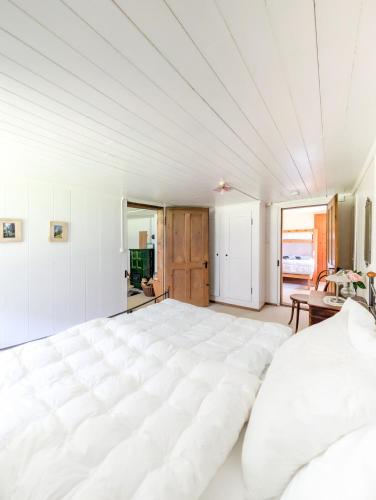 Postel nebo postele na pokoji v ubytování Maison rustique au cœur de la nature - Jaun, Charmey