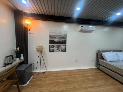 Una televisión o centro de entretenimiento en Casa Pages'
