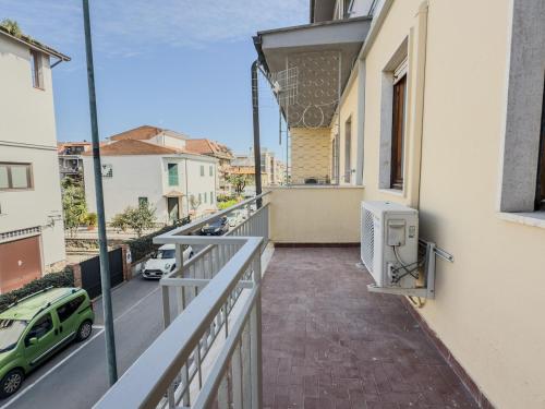 a balcony with a heater on the side of a building at La Casa di Dario - Super Luminosa - 5' dal mare in Albinia