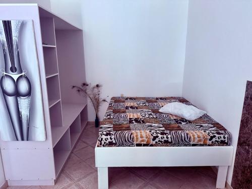 Ένα ή περισσότερα κρεβάτια σε δωμάτιο στο CasaLoca Cabarete Studio Apartment