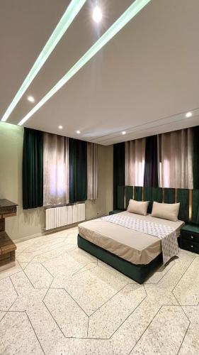 Katil atau katil-katil dalam bilik di Appartement Al Arz Atlas