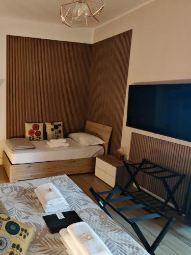 MC FLY ROOMS Malpensa airportにあるベッド