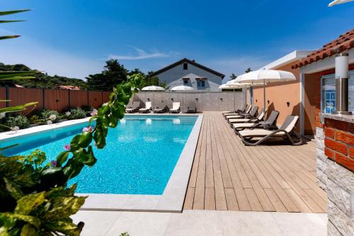 Apartments Foric Rab with Heated Pool, Sauna & Gym