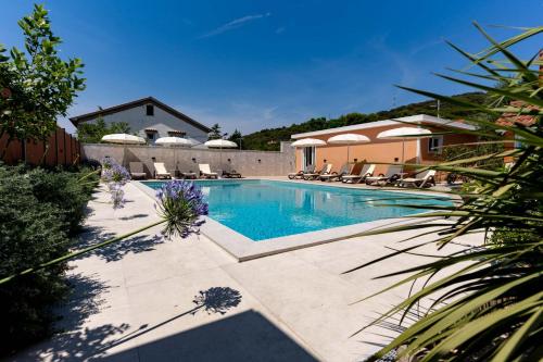Apartments Foric Rab with Heated Pool, Sauna & Gym