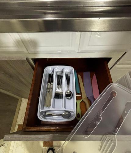 a drawer filled with utensils in a kitchen at Apto 201 2H 2B Belén Fátima MUY bien ubicado in Medellín