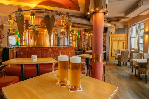 Boissons dans l'établissement Charmante Design-Maisonette in Schiffweiler - 2 Etagen - ruhig gelegen - bis 7 Pers - WLAN - 2 Parkplätze - Balkon & Garten - Self-Check-in - Nähe See & Wald