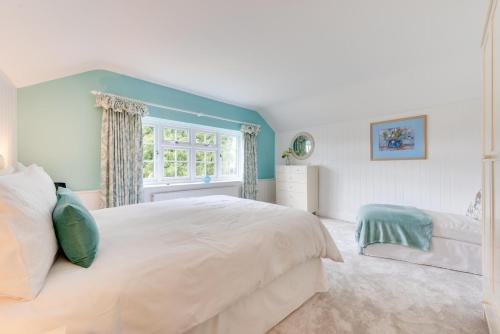 Postel nebo postele na pokoji v ubytování Knapton Hall Cottage