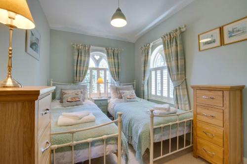 Postel nebo postele na pokoji v ubytování South Lodge