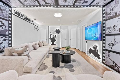Un lugar para sentarse en 2025 NEW 10BD At Windsor Cay Pool and Game Room