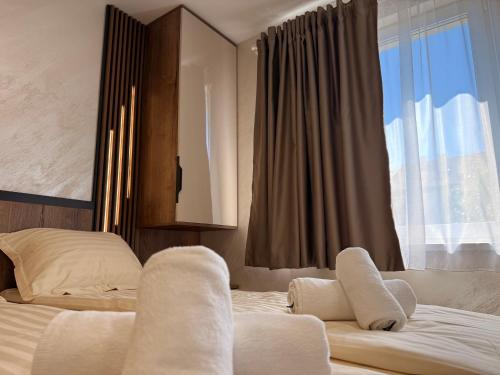 Serenity Suitesにあるベッド