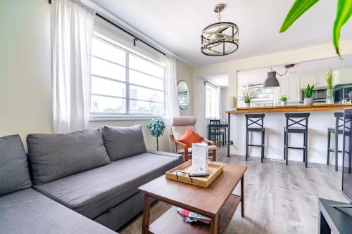 a living room with a couch and a table at Short North Convention Private Parking Pets! in Columbus