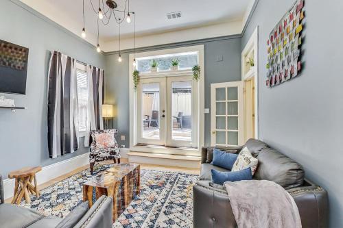 a living room with a couch and a table at LIVE IT UP In The Castro! 4BRWDWalk Score 98 in San Francisco