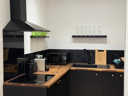 ครัวหรือมุมครัวของ Bel appartement au centre ville de Carpentras