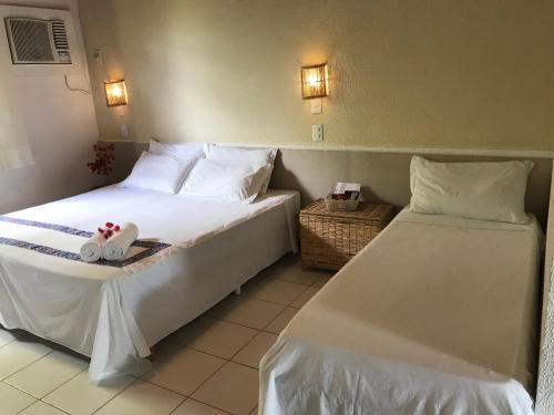 Postel nebo postele na pokoji v ubytování Cabana Eco Resort