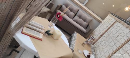 an overhead view of a table with a book on it at HOME DOLCE LUNA in Castelvetrano Selinunte