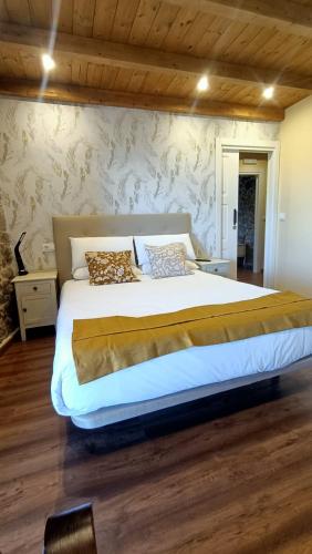 Ένα ή περισσότερα κρεβάτια σε δωμάτιο στο Apartamentos Alburiña