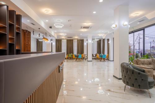Ein Sitzbereich in der Unterkunft BRB Hotel