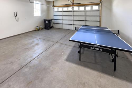 a ping pong table in a room with a tennis court at Scenic Mountain Stay Near Deer Valley Ski! in Heber City