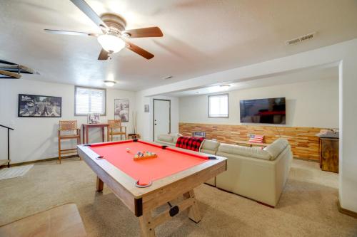 a living room with a ping pong table at Mtn-View Oasis with Pool Access in Garden Valley in Garden Valley