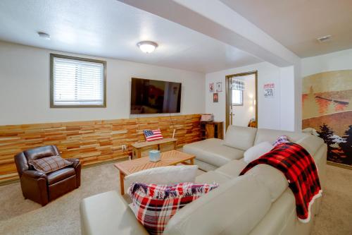 a living room with a couch and a chair at Mtn-View Oasis with Pool Access in Garden Valley in Garden Valley