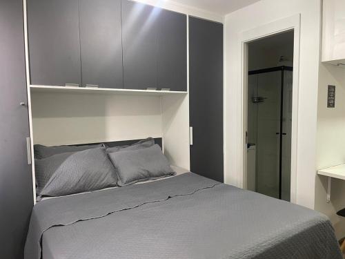 Postel nebo postele na pokoji v ubytování Studio Novo Brás