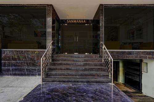 a set of stairs in front of a building at Super Townhouse OAK Clove Boutique Hotel Rajaji Nagar Near Lulu Mall Bengaluru in Bengaluru