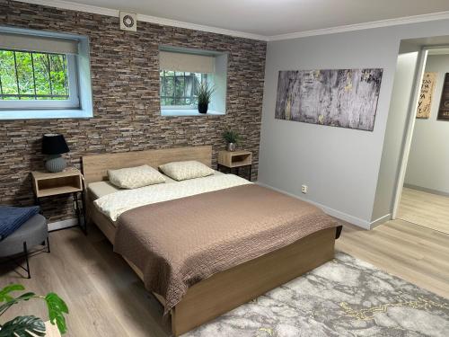 Кровать или кровати в номере Zair Apartments