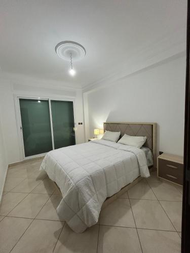 Ένα ή περισσότερα κρεβάτια σε δωμάτιο στο AFOULKI house