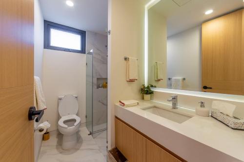 Ένα μπάνιο στο Departamento Nuevo 2 Recámaras en Bucerías Vista al Mar