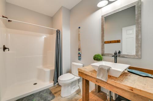 a bathroom with a sink and a toilet at Crooked Lake Escape Near Skiing, Farms and Festivals in Averill Park