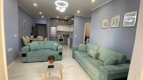 Svetainės erdvė apgyvendinimo įstaigoje BMB Apartament