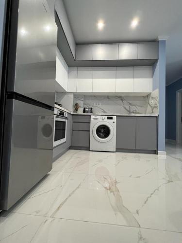 Virtuvė arba virtuvėlė apgyvendinimo įstaigoje BMB Apartament