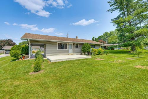 a home with a yard with a house at Near Dtwn Harrisburg Stylish Home with Patio and Yard in Camp Hill