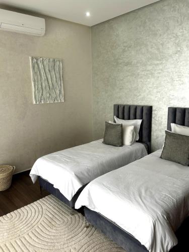 Postel nebo postele na pokoji v ubytování Villa Ramona
