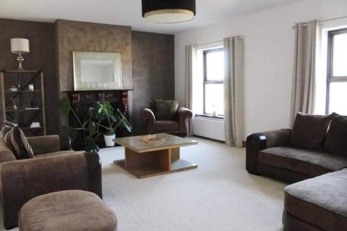 Χώρος καθιστικού στο Loughview Holiday Home