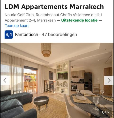 a living room with a couch and a table at LDM Appartements Marrakech in Marrakech