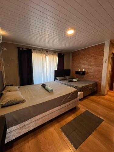 Postel nebo postele na pokoji v ubytování Casa Estilo Industrial