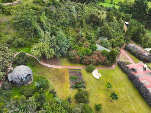 an aerial view of a garden and a house at La Divina de Juaica in Tenjo