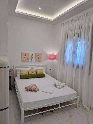 Ένα ή περισσότερα κρεβάτια σε δωμάτιο στο Polidoros tiny house