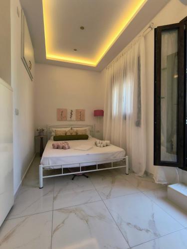 Ένα ή περισσότερα κρεβάτια σε δωμάτιο στο Polidoros tiny house