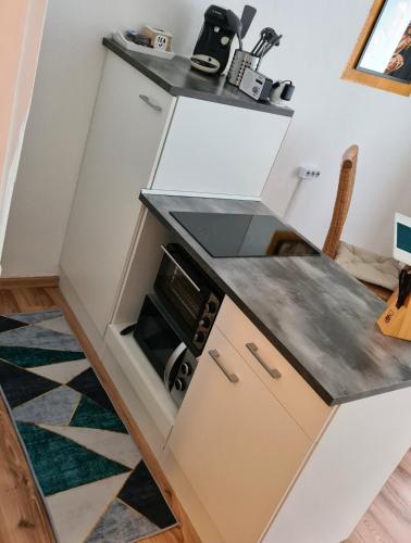 Dapur atau dapur kecil di 1 Zimmer Gold Studio in der City
