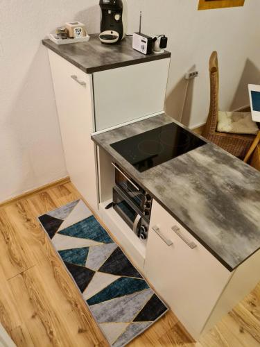 Dapur atau dapur kecil di 1 Zimmer Gold Studio in der City