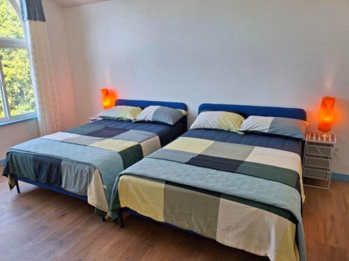 Кровать или кровати в номере Blue Villa by the Sea