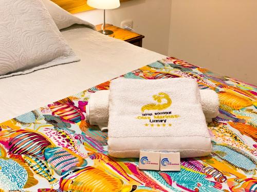 Кровать или кровати в номере Hotel Boutique Olas Marinas Luxury