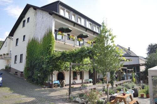 Photo de la galerie de l'établissement Hotel - Pension Wendland, à Wintrich