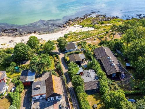 an aerial view of a beach with houses at Seaside Bliss in Sandkas - By Traum Ferienwohnungen in Allinge
