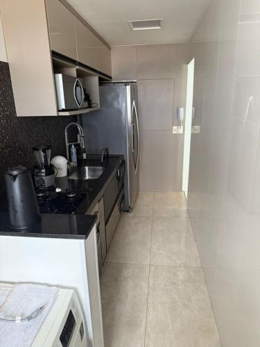 Photo de la galerie de l'établissement Apartamento com suíte e vista para o mar, à Vila Velha