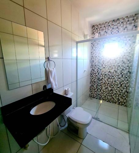Bilik mandi di Apartamento Aconchegante a Poucos Passos da Praia