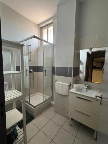 a bathroom with a shower and a sink at La Parenthèse Enchantée Avignon in Avignon
